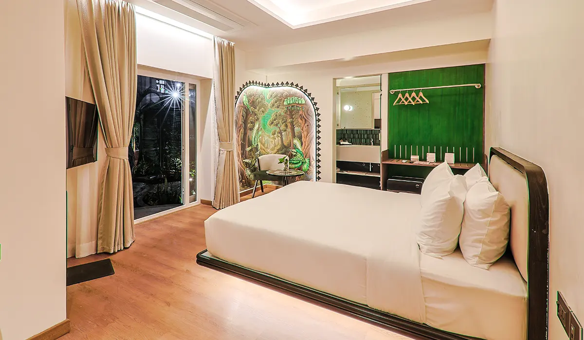 Romantic bedroom setup at a luxury resort in Goa ideal for honeymoon and couple stays